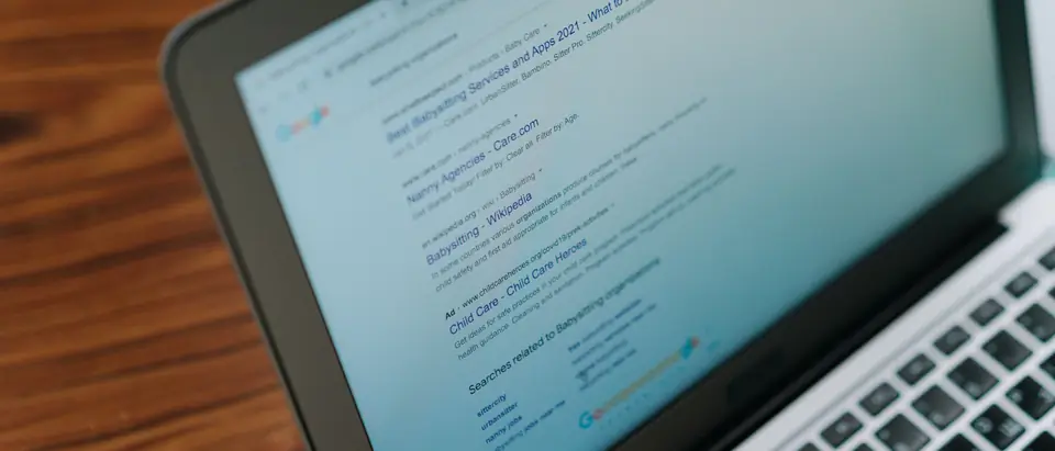 A laptop screen showing a page of search results